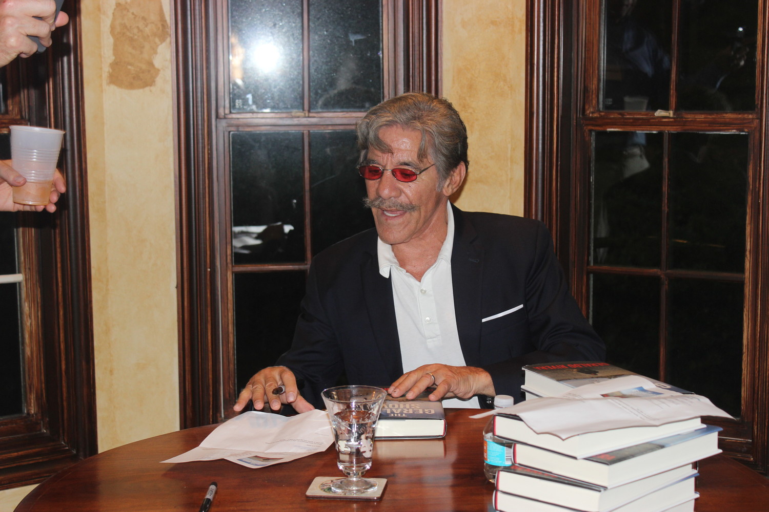Longtime journalist Geraldo Rivera signs copies of his new book, “The Geraldo Show: A Memoir,” at a private event hosted by Janet and Dale Westling at their house in Sawgrass Country Club on June 2.